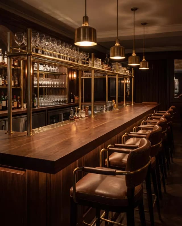 Walnut bar top — a brass-railed restaurant bar