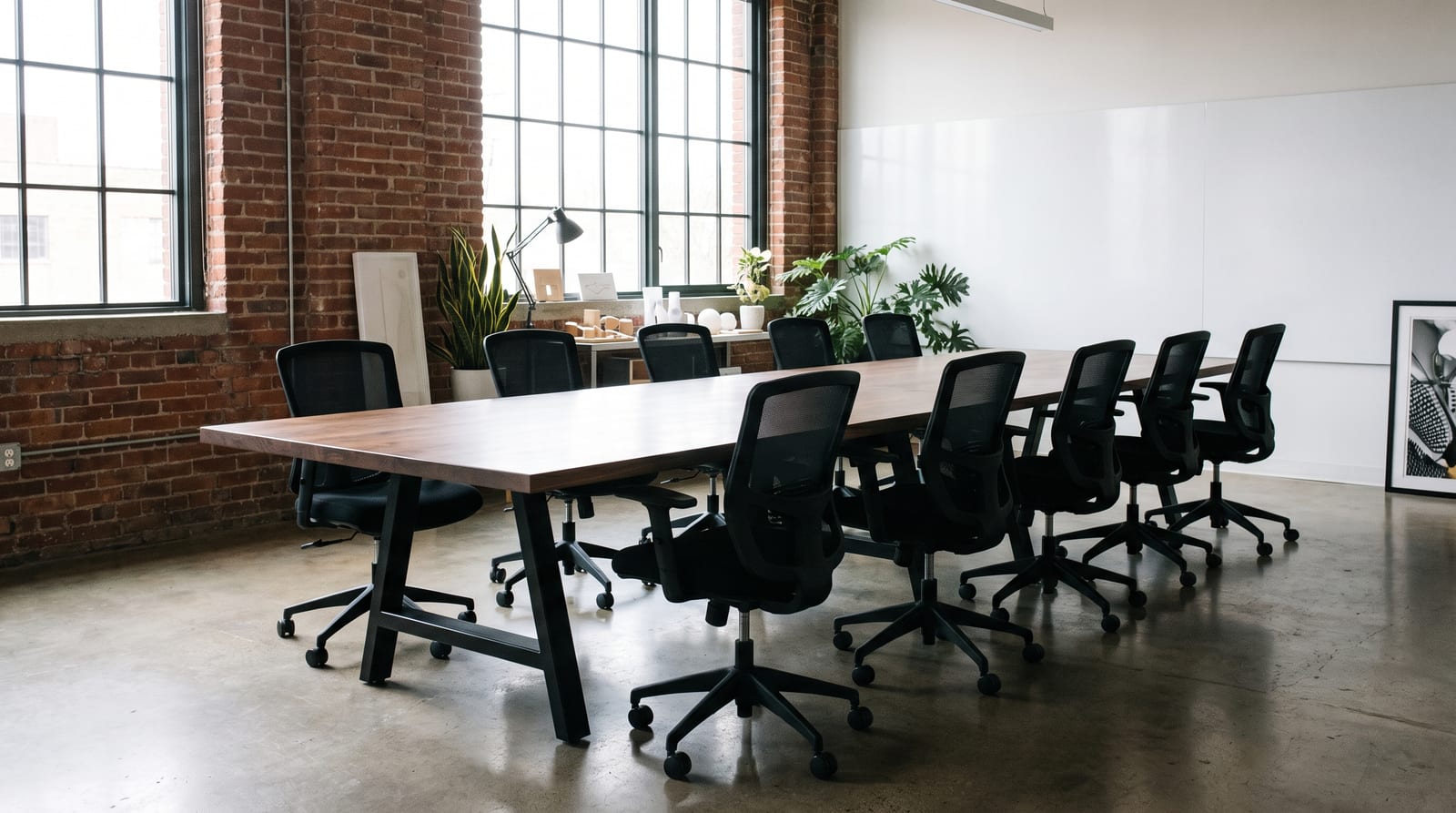Solid walnut tabletop, face grain — a brick loft, walnut conference table on steel A-frame bases