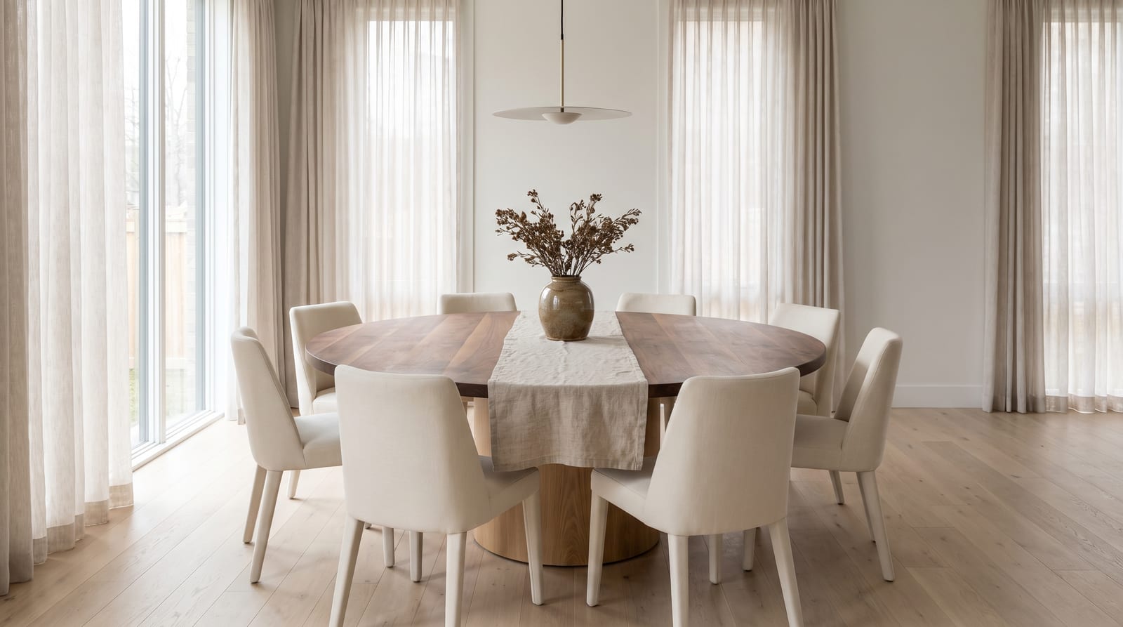 Solid walnut round tabletop, face grain — a family dining room, 72-inch round walnut table on an oak pedestal